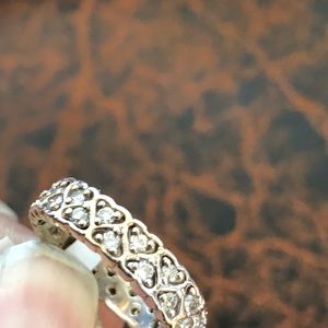 1 tcw moissanite heart eternity band.
